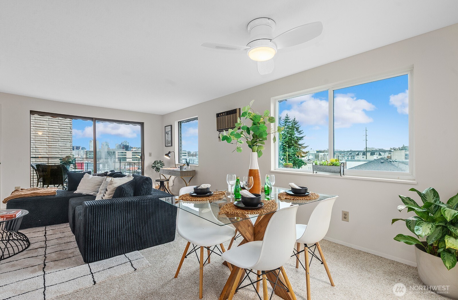 610 Aloha Street, Unit 404 Seattle, WA 98109 - Photo 9 of 23 a view of a dining room with furniture window and outside view