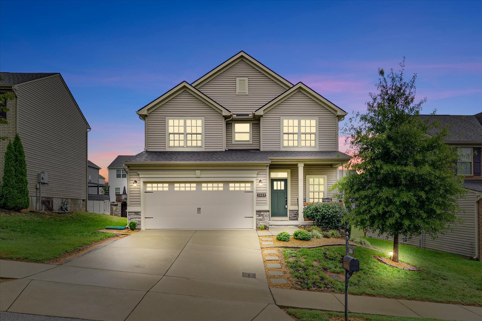 3204 Garrett Lane Columbia, TN 38401 - Photo 1 of 33 a front view of a house with garden