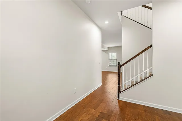 a view of entryway with wooden floor