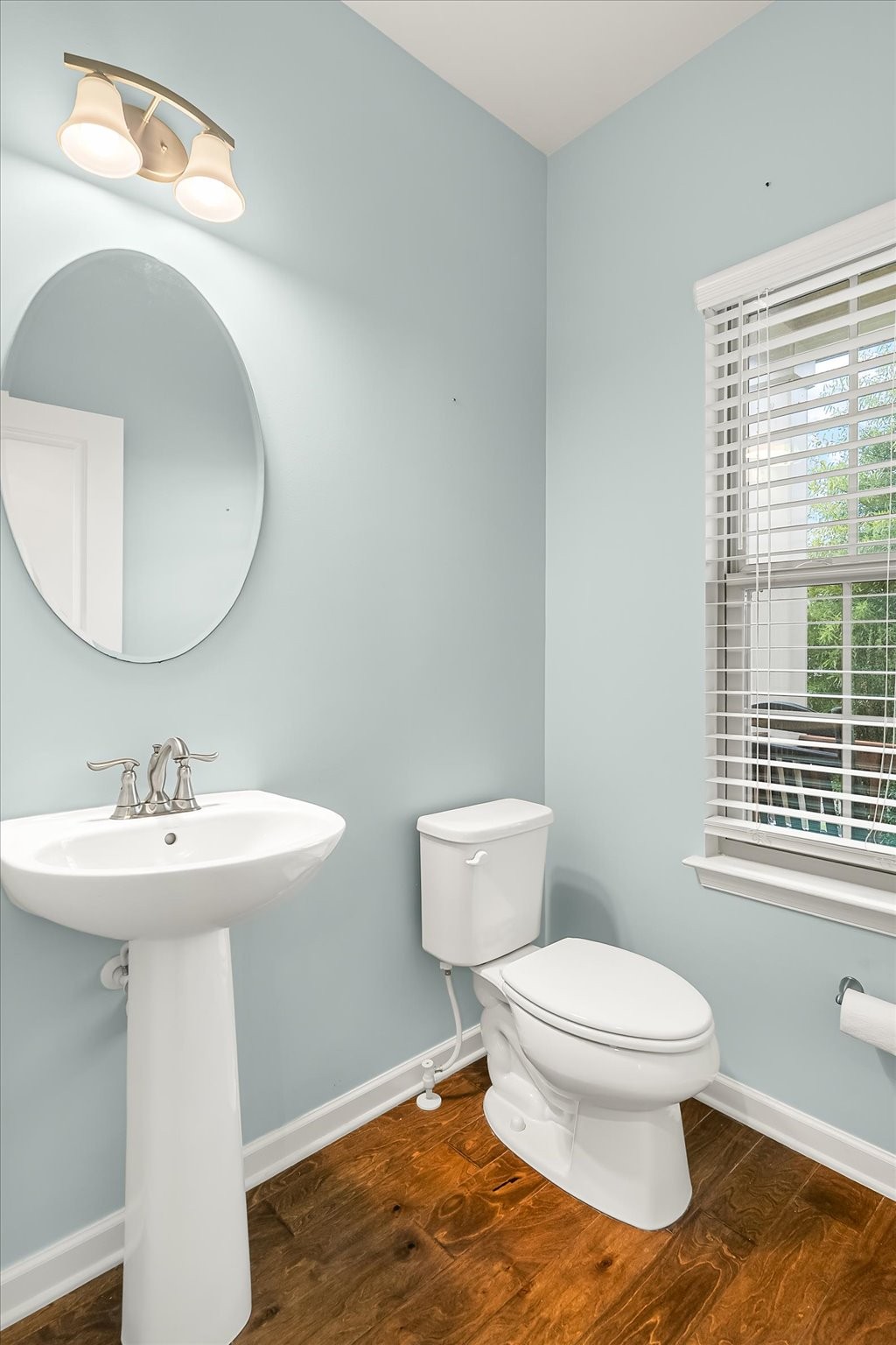 3204 Garrett Lane Columbia, TN 38401 - Photo 13 of 33 a bathroom with a toilet a sink and mirror