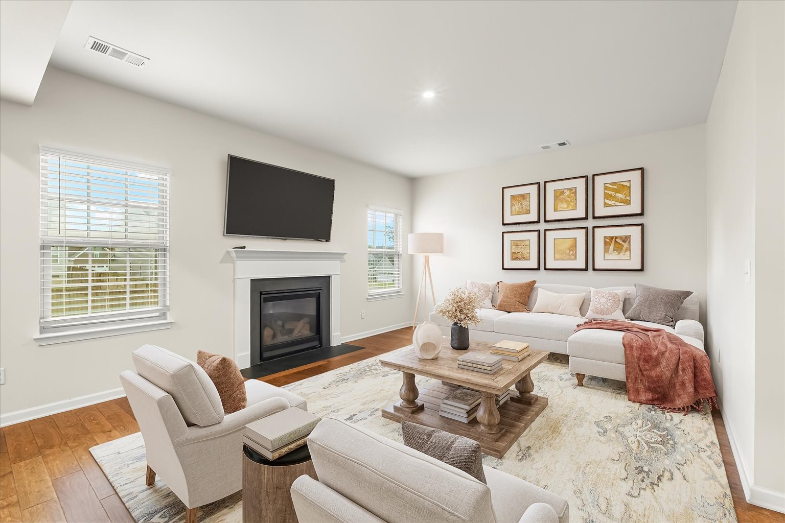 3204 Garrett Lane Columbia, TN 38401 - Photo 16 of 33 a living room with furniture a fireplace and a flat screen tv