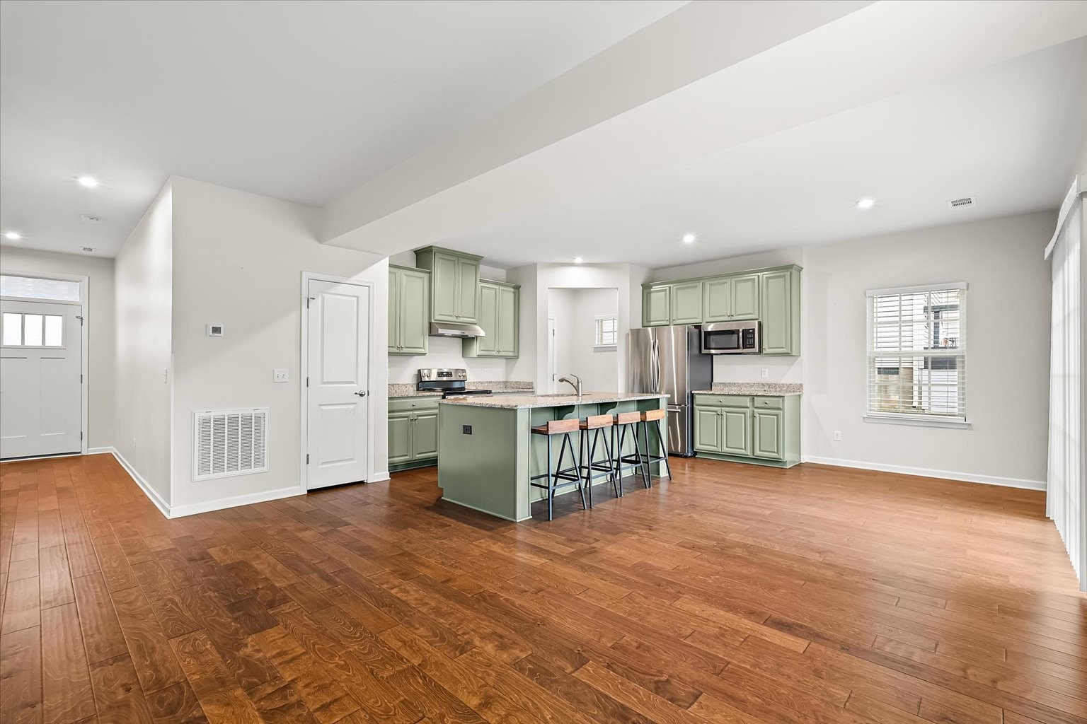 3204 Garrett Lane Columbia, TN 38401 - Photo 17 of 33 a view of kitchen with furniture and wooden floor
