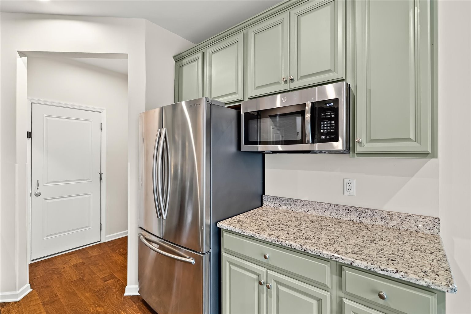 3204 Garrett Lane Columbia, TN 38401 - Photo 22 of 33 a kitchen with granite countertop stainless steel appliances and refrigerator