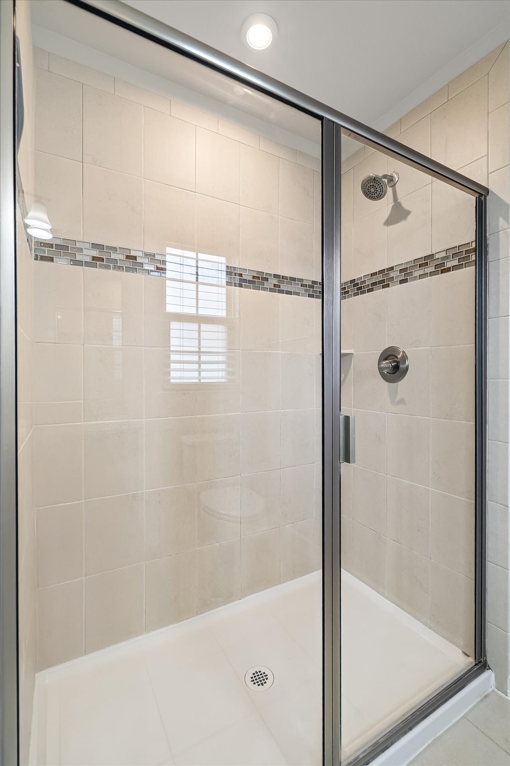 3204 Garrett Lane Columbia, TN 38401 - Photo 28 of 33 a bathroom with a glass shower door