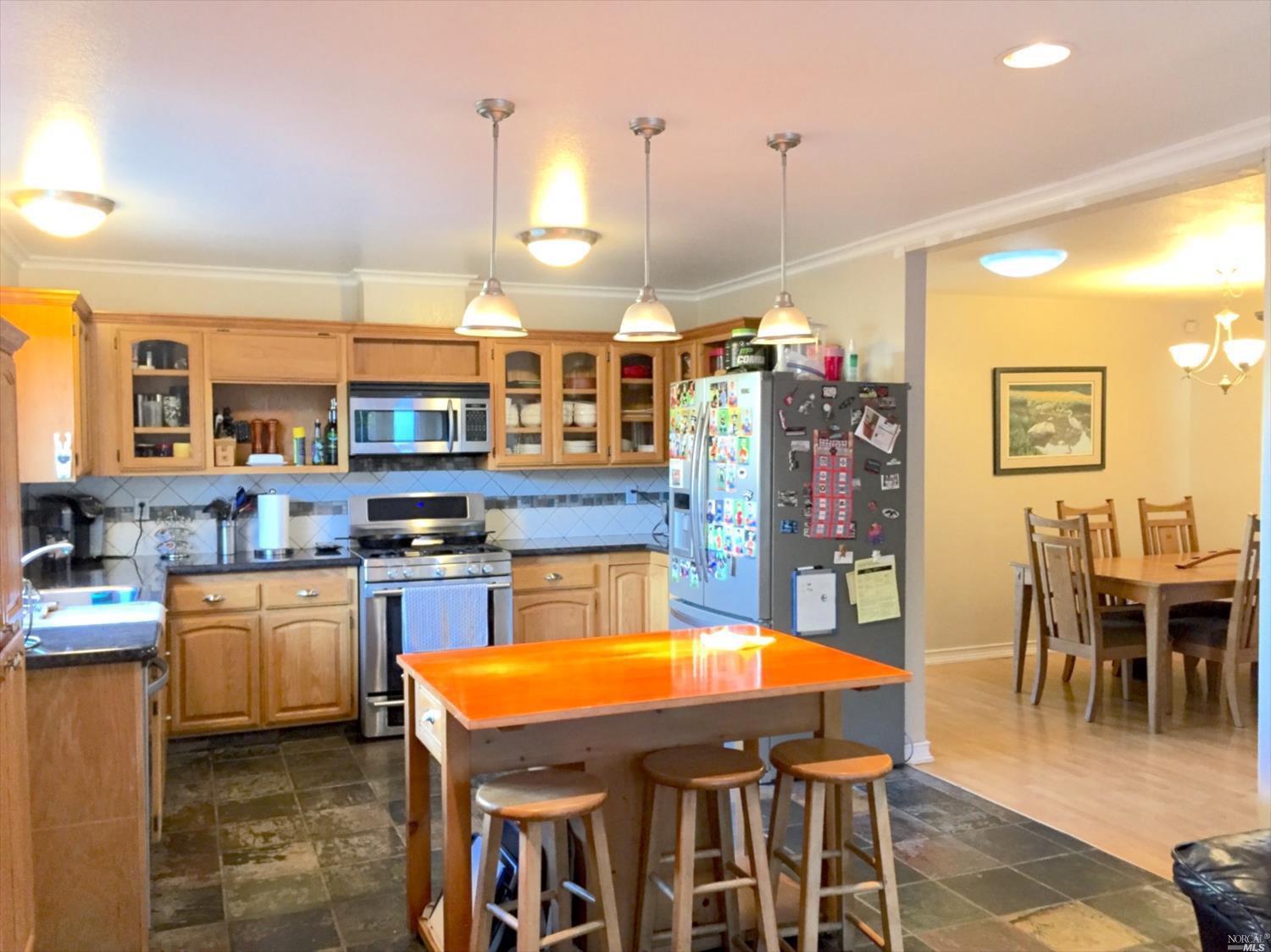 1406 Gregory Court Rohnert Park, CA 94928 - Photo 1 of 1 This kitchen is spacious and loaded with special features. The gas stove and microwave stay with the home