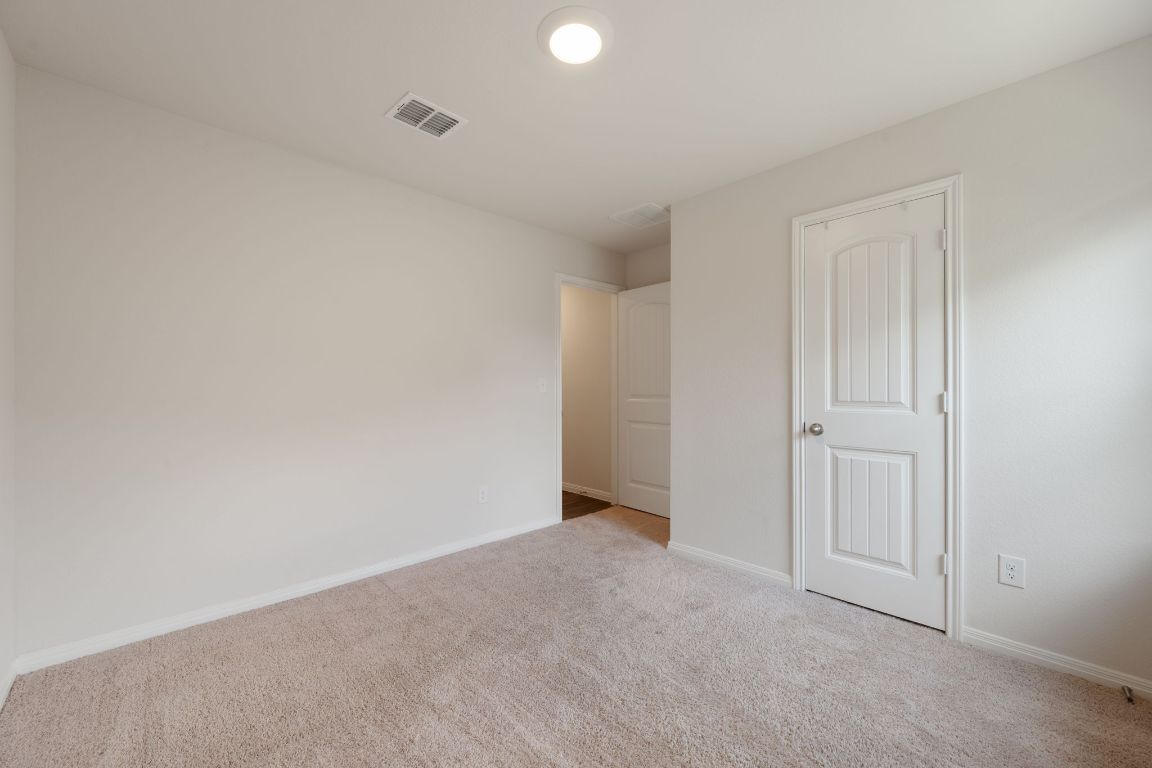13908 Mamie Eisenhower Road Manor, TX 78653 - Photo 15 of 23 a view of an empty room