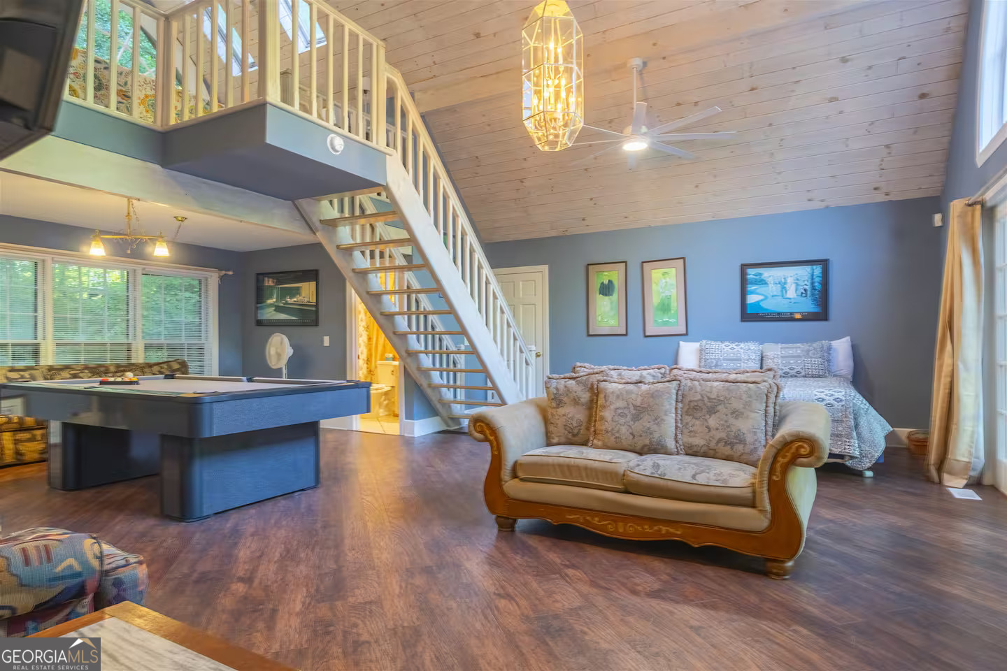 144 Fussen Strasse Helen, GA 30545 - Photo 21 of 38 a living room with furniture and a wooden floor