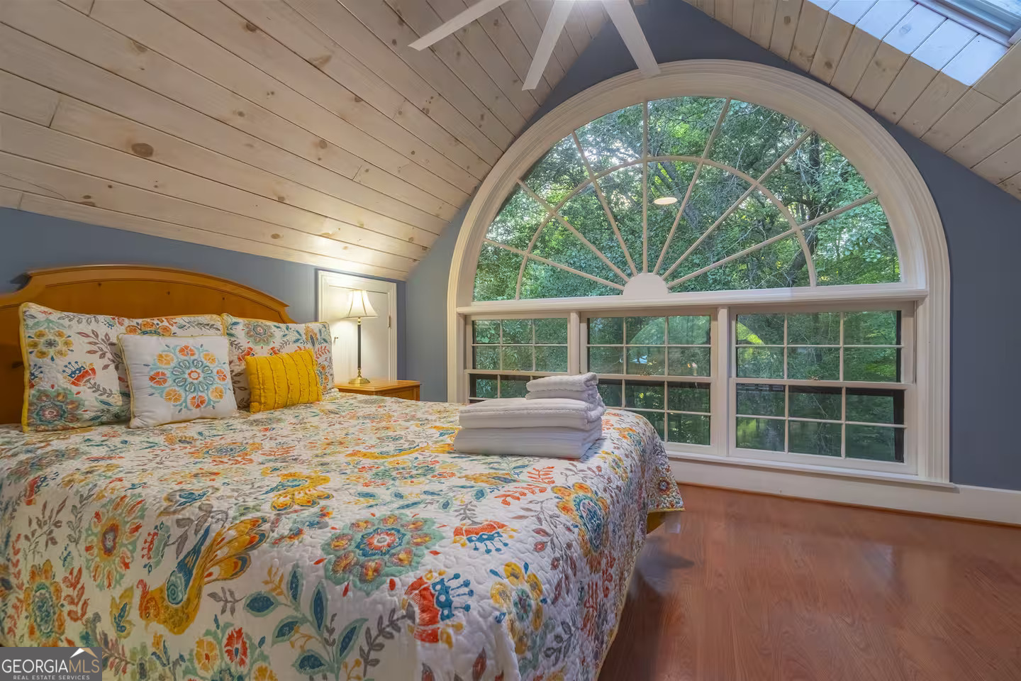 144 Fussen Strasse Helen, GA 30545 - Photo 24 of 38 a large bed sitting in a bedroom next to a window