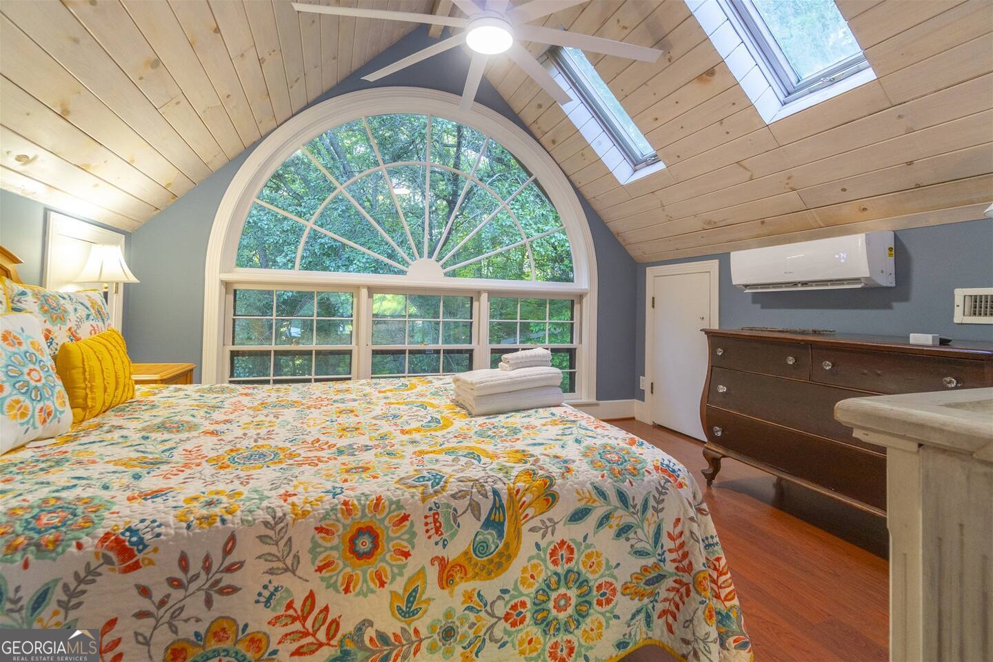 144 Fussen Strasse Helen, GA 30545 - Photo 26 of 38 a large bed sitting in a bedroom next to a window