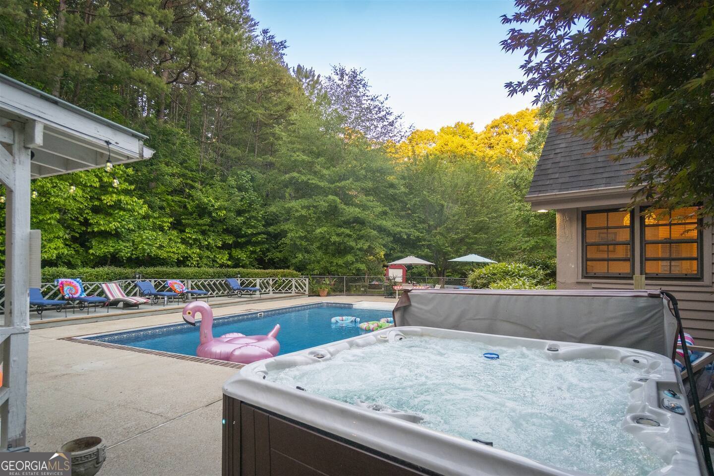 144 Fussen Strasse Helen, GA 30545 - Photo 33 of 38 a view of backyard with swimming pool and outdoor seating