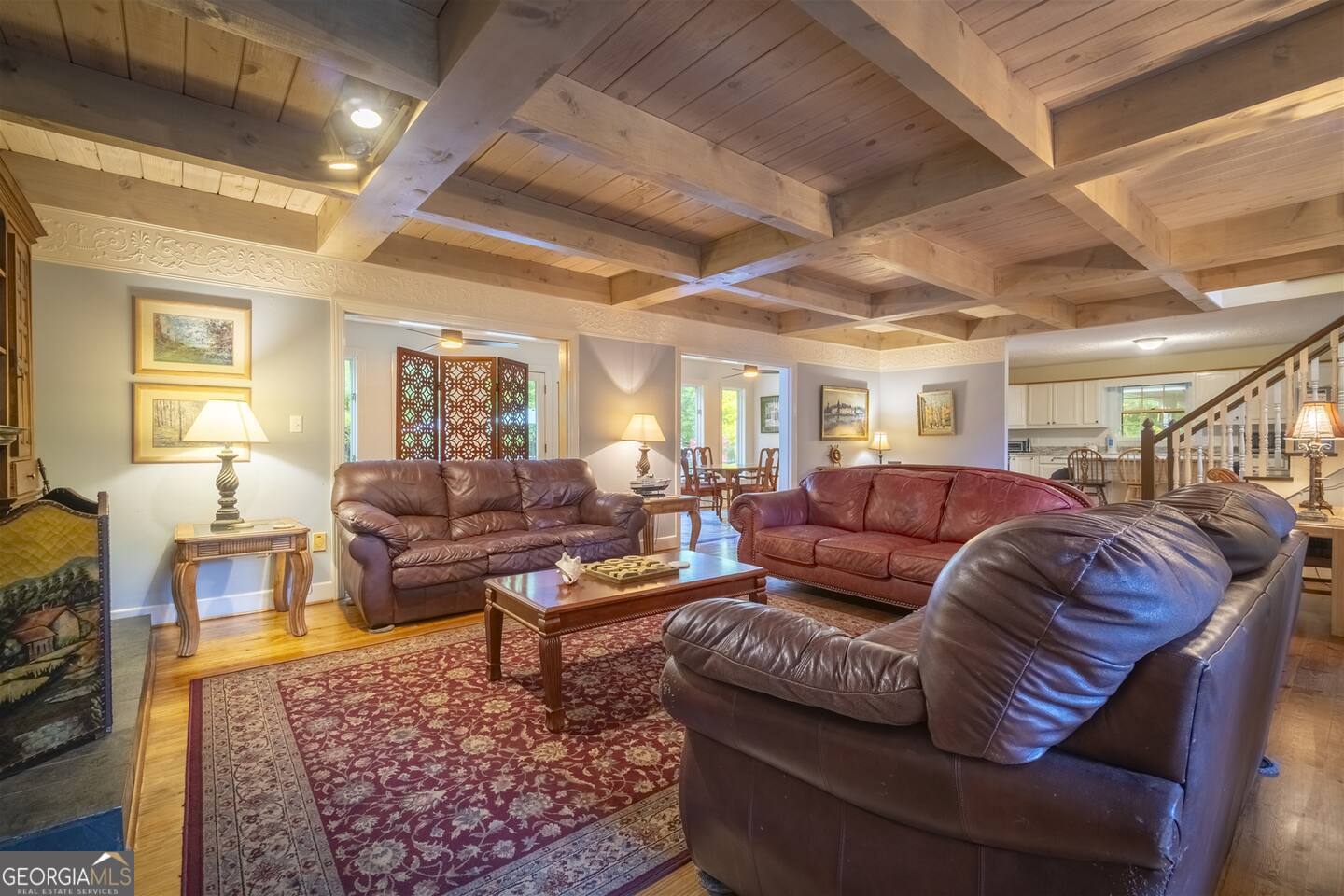 144 Fussen Strasse Helen, GA 30545 - Photo 5 of 38 a living room with lots of furniture and a rug