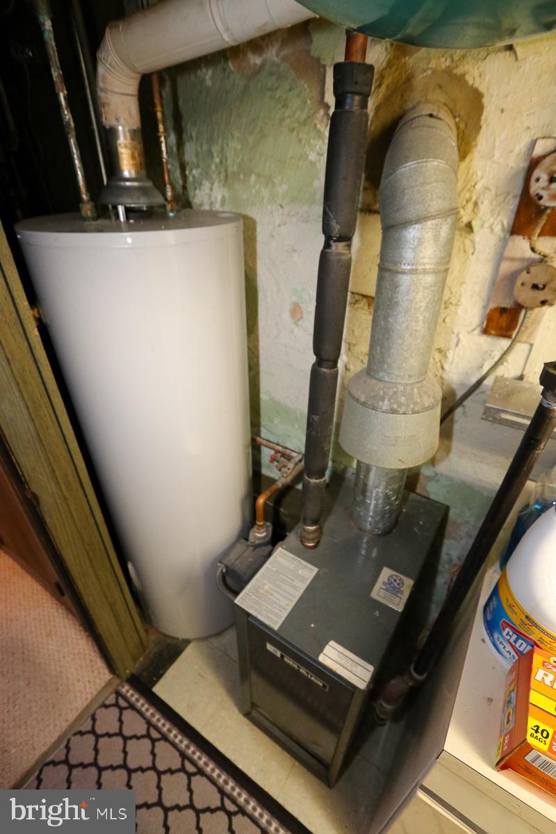 868 Medway Road Philadelphia, PA 19115 - Photo 49 of 56 Gas heater & h/w heater