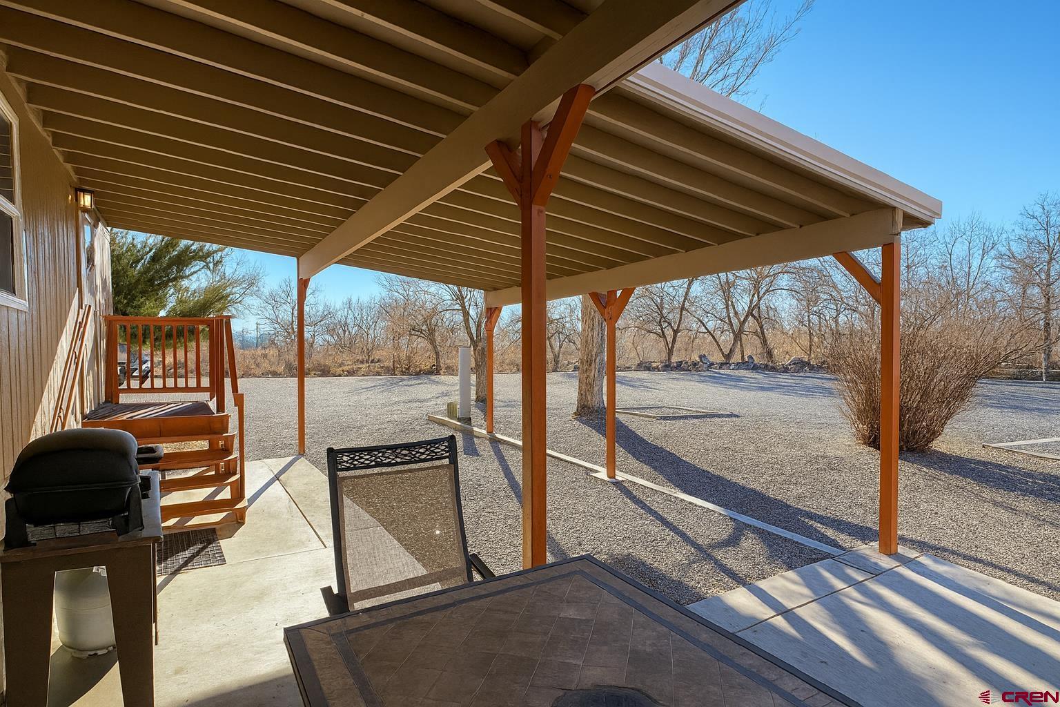 676 Highway 50, Unit SPACE 44 Delta, CO 81416 - Photo 27 of 29 a view of a porch with furniture and floor