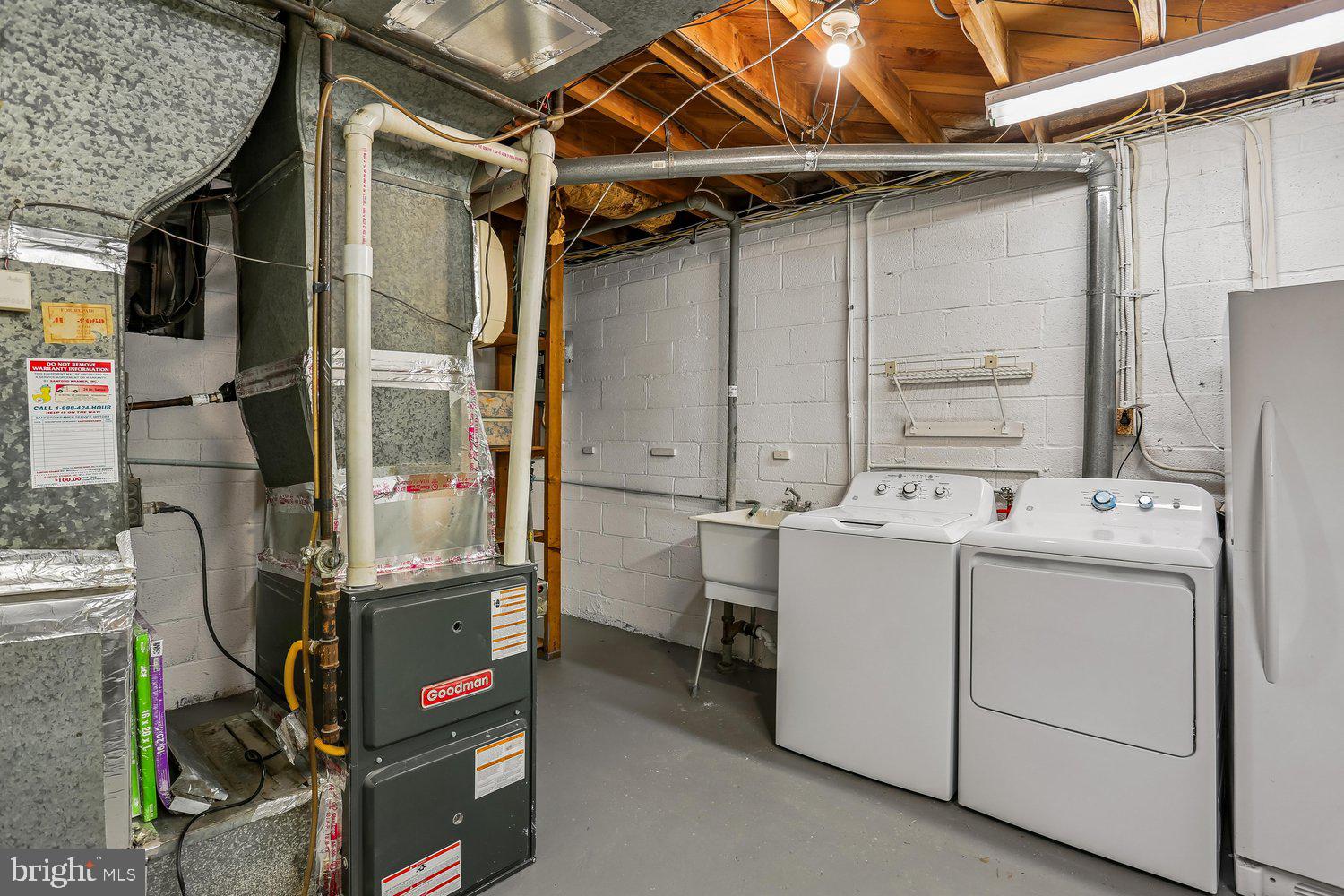 907 Hoyt Street Silver Spring, MD 20902 - Photo 55 of 69 a utility room with dryer and washer
