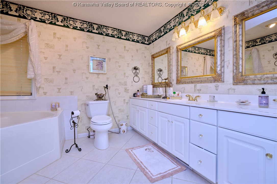 216 Flintlock Road Charleston, WV 25314 - Photo 18 of 33 First floor primary bath.