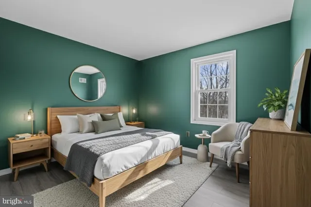 a front view of house with a garden