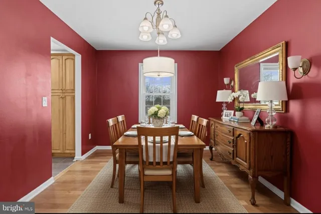 a kitchen with stainless steel appliances granite countertop a stove refrigerator sink and microwave