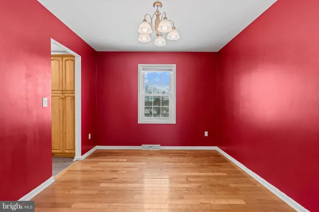 a kitchen with stainless steel appliances granite countertop a refrigerator stove microwave and sink