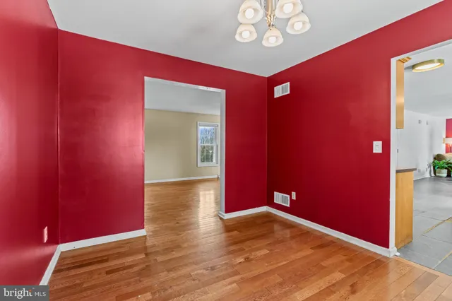 a kitchen with stainless steel appliances granite countertop a refrigerator sink and cabinets