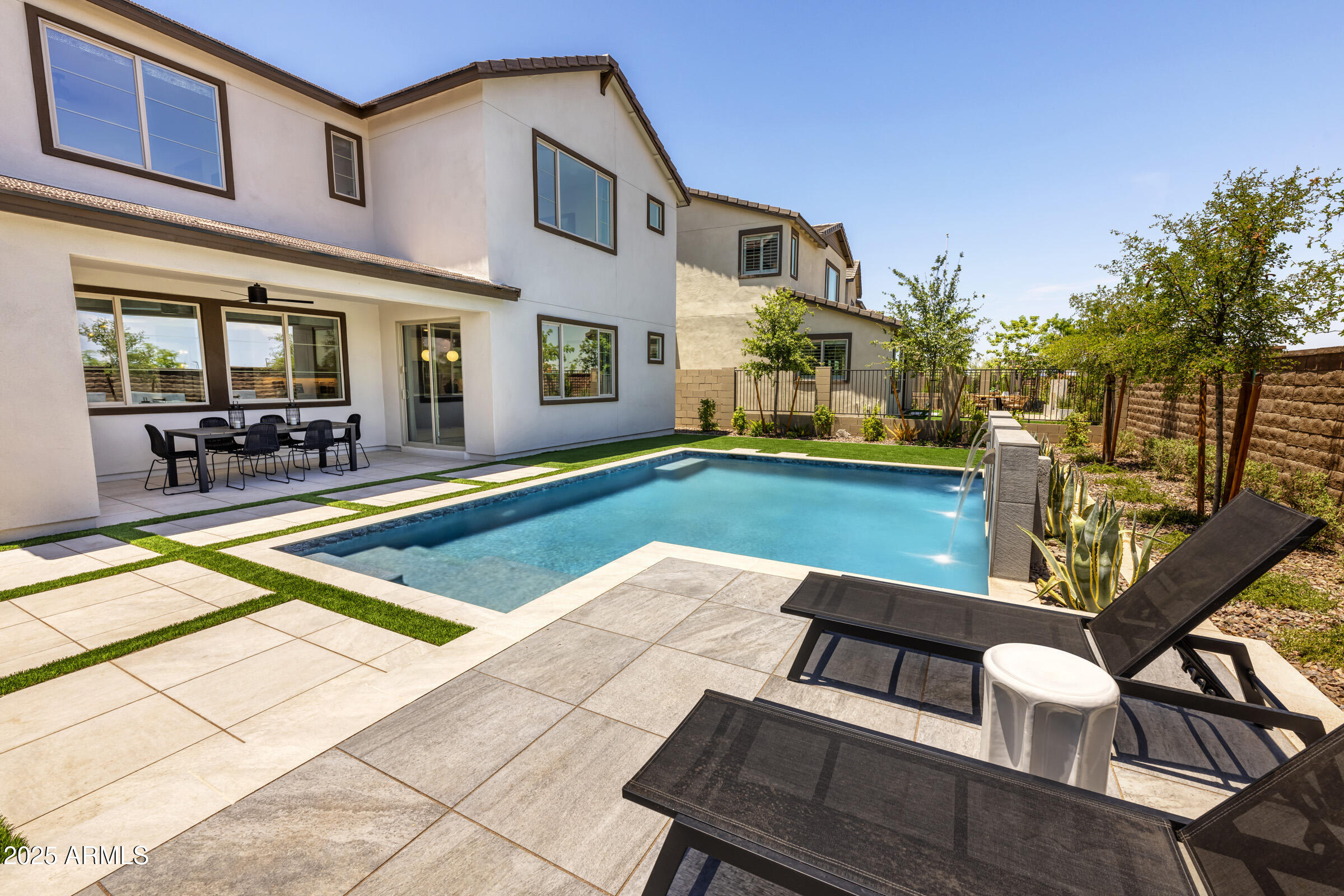 1526 East Coconino Way Gilbert, AZ 85298 - Photo 13 of 15 a view of a house with swimming pool and sitting area