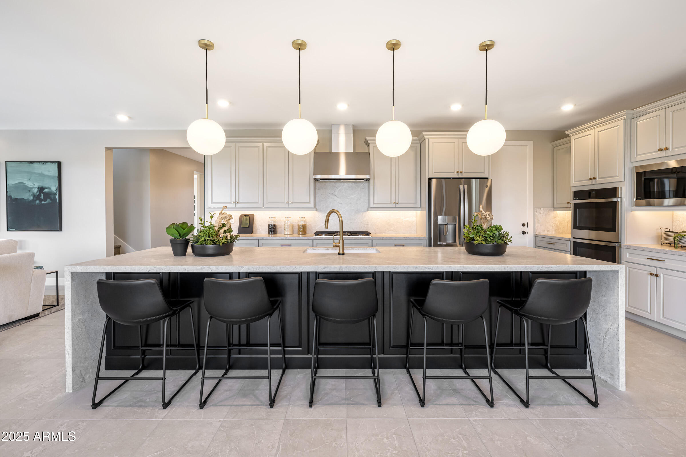 1526 East Coconino Way Gilbert, AZ 85298 - Photo 2 of 15 a large kitchen with a table and chairs