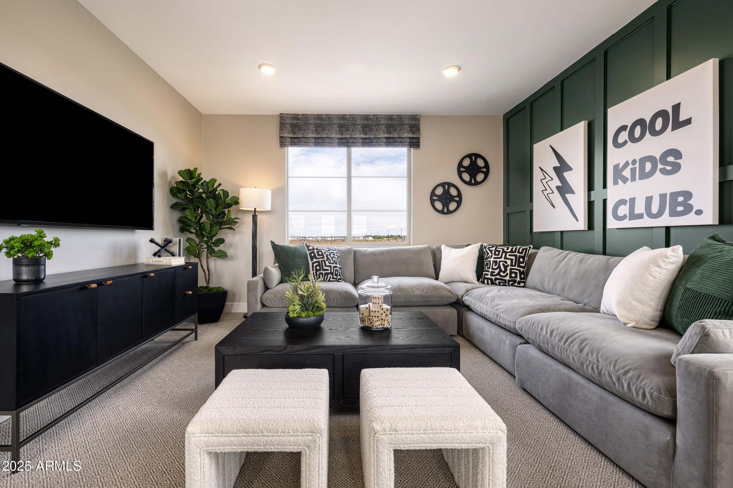 1526 East Coconino Way Gilbert, AZ 85298 - Photo 7 of 15 a living room with furniture a flat screen tv and a large window