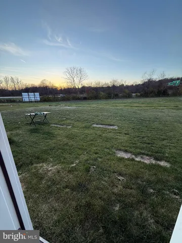 a view of a lake from a yard