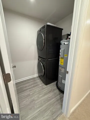 a view of a storage & utility room with wooden floor