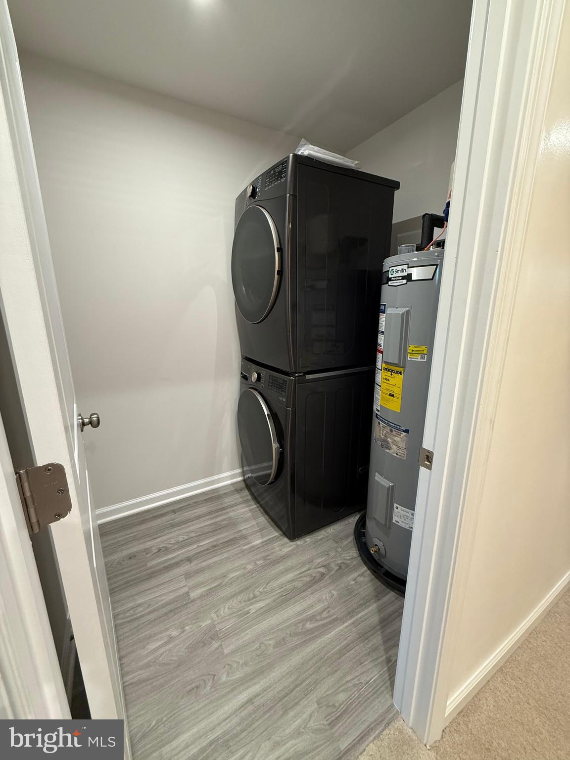 179 Olympus Road Charles Town, WV 25414 - Photo 14 of 26 a view of a storage & utility room with wooden floor