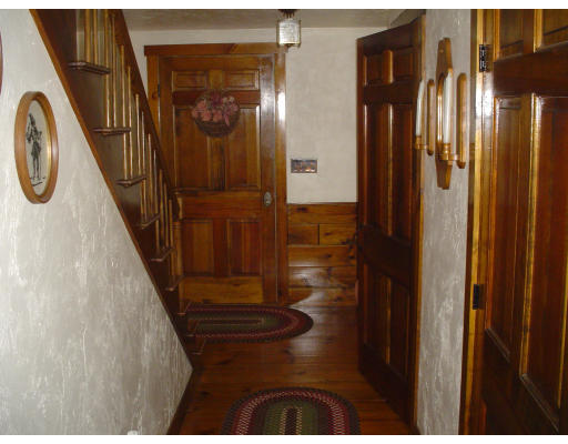934 Piper Road Ashby, MA 01431 - Photo 8 of 10 a view of a hallway with wooden floor