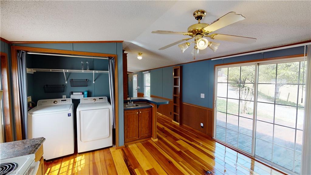 238 Wayne Marshall Road Elkin, NC 28621 - Photo 18 of 38 Kitchen looking out sliding door to the front