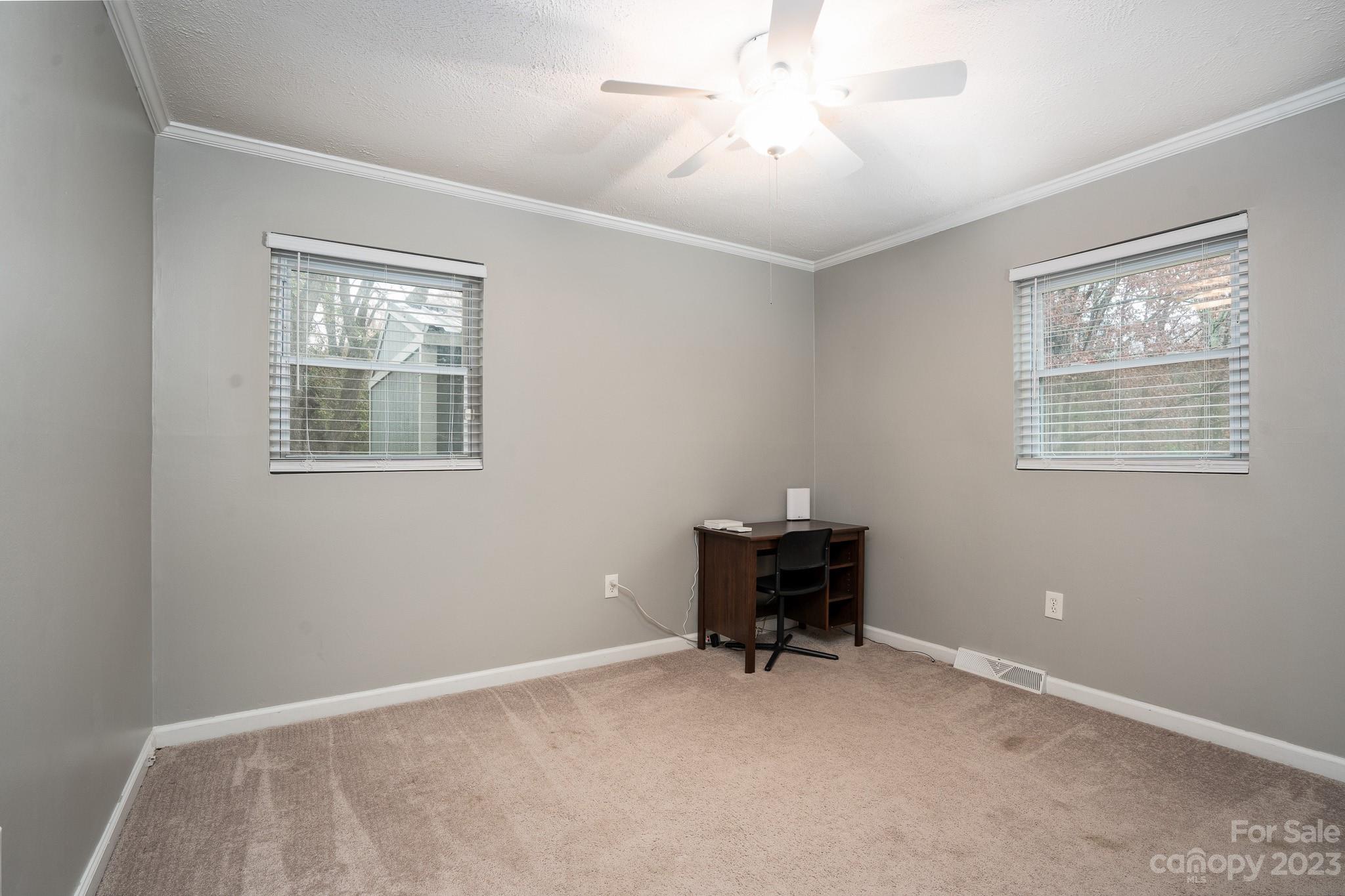 1250 B Street Mount Pleasant, NC 28124 - Photo 11 of 19 a view of room with workspace and a window