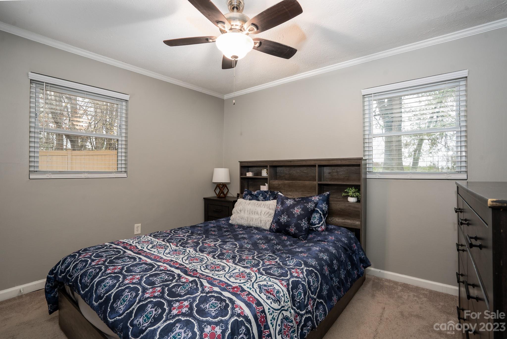 1250 B Street Mount Pleasant, NC 28124 - Photo 14 of 19 a bedroom with a bed and a window