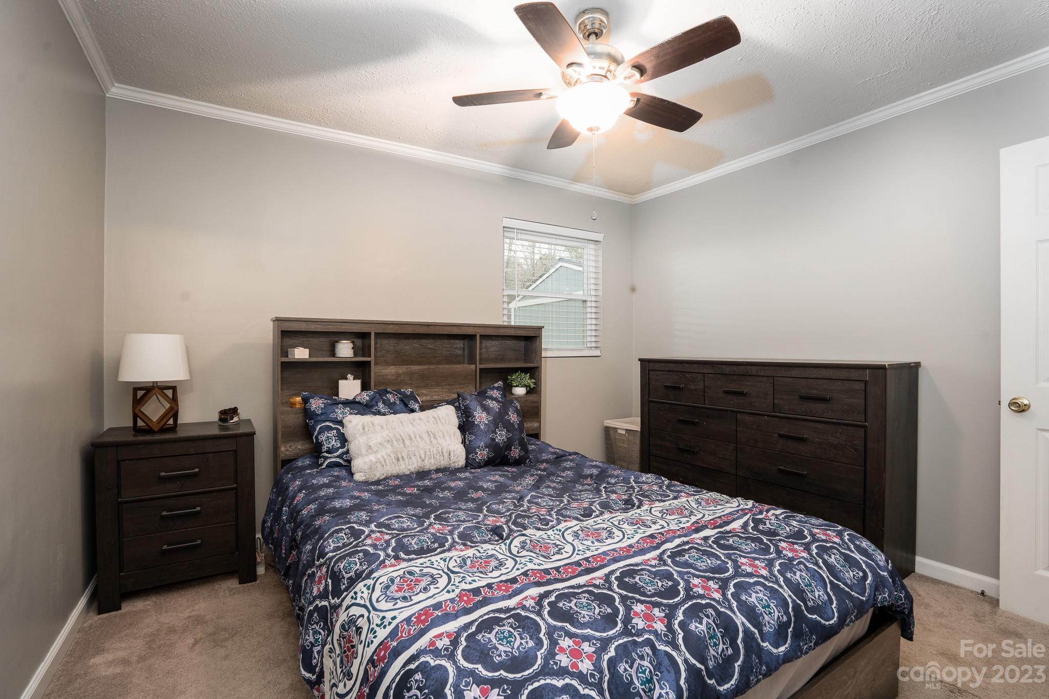 1250 B Street Mount Pleasant, NC 28124 - Photo 15 of 19 a bedroom with a bed and a closet
