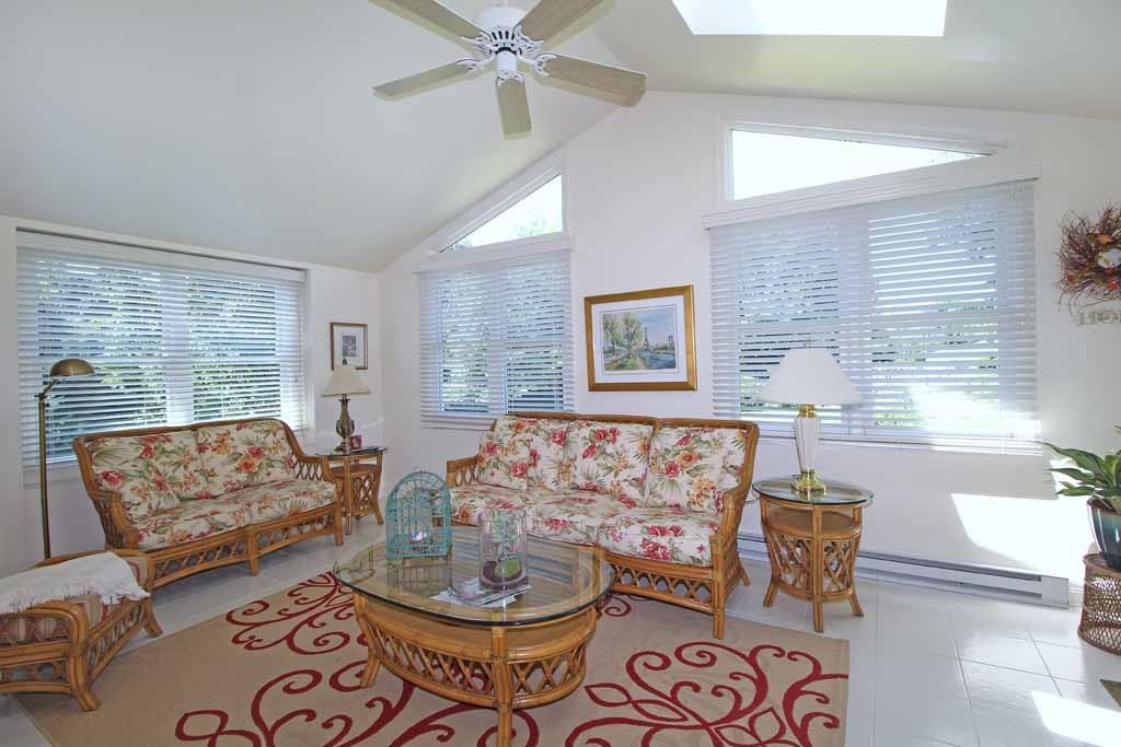 333 Linnwood Road Eighty Four, PA 15330 - Photo 11 of 25 LOVELY SUNROOM OFF KITCHEN WITH VAULTED CEIL, CT FL, CEIL FAN, SKYLITE WITH ACCESS TO COVERED DECK
