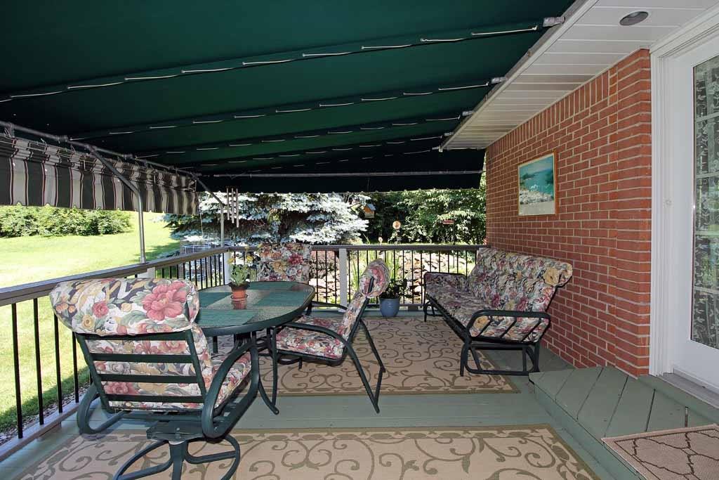 333 Linnwood Road Eighty Four, PA 15330 - Photo 12 of 25 LOVELY DECK WITH AWNING, ACCESS FROM SUNROOM AND DINING ROOM
