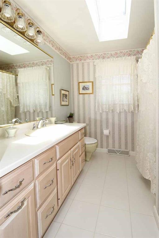 333 Linnwood Road Eighty Four, PA 15330 - Photo 16 of 25 MAIN BATH WITH DOUBLE BOWL SINK, CT FLOOR, SKYLITE