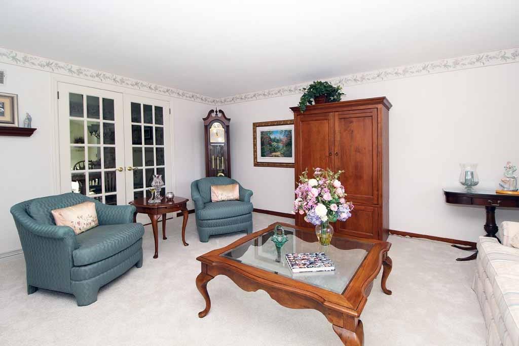 333 Linnwood Road Eighty Four, PA 15330 - Photo 5 of 25 VIEW OF LIVING ROOM SHOWING DOUBLE DOORS TO KITCHEN