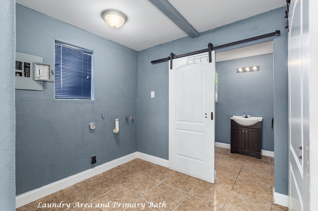 2915 Freeman Street Lufkin, TX 75901 - Photo 20 of 33 a bathroom with a shower and a sink