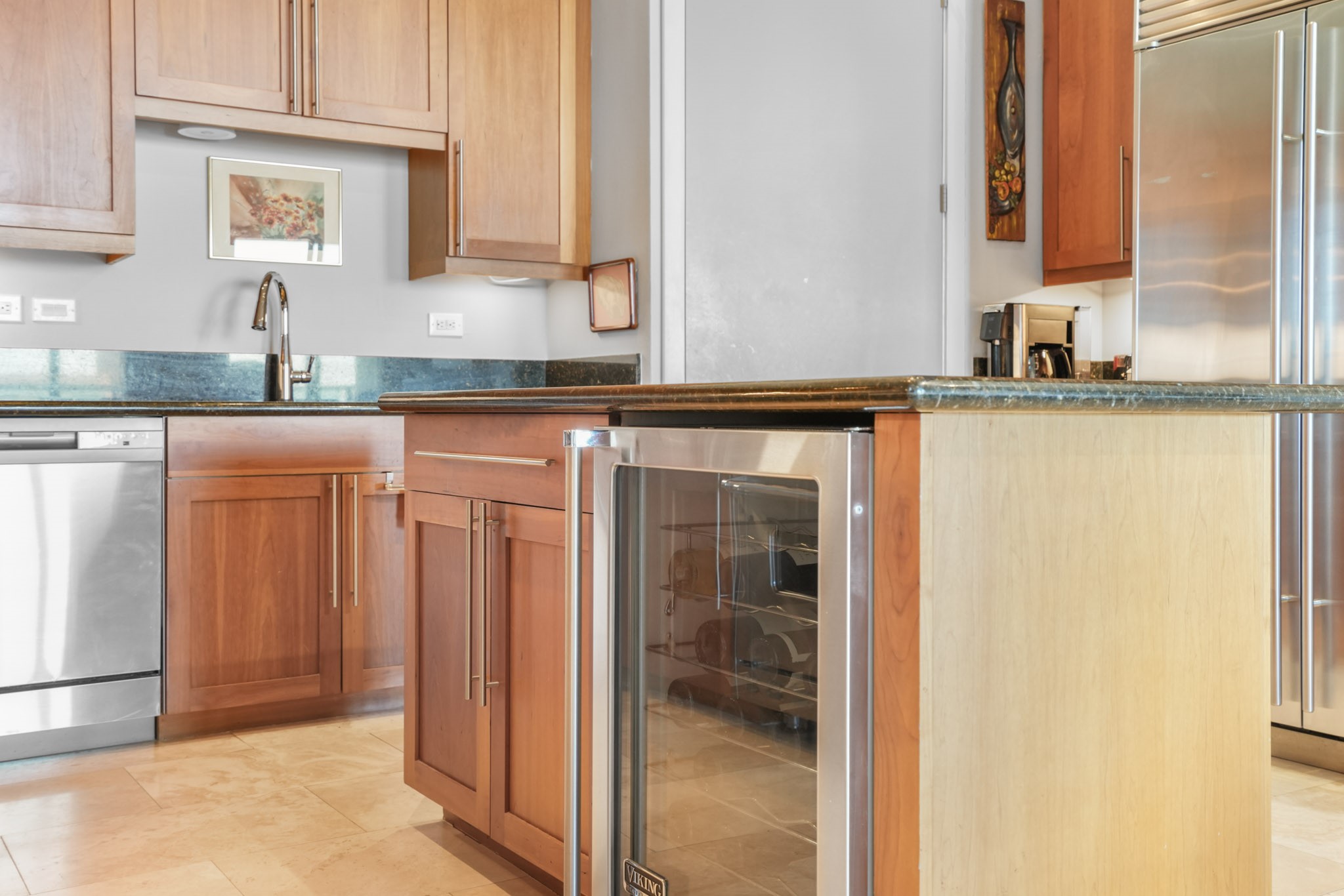 3388 Sage Road, Unit 2102 Houston, TX 77056 - Photo 9 of 21 Spacious kitchen featuring a Viking 6-burner gas range, wine fridge, and walk-in pantry.