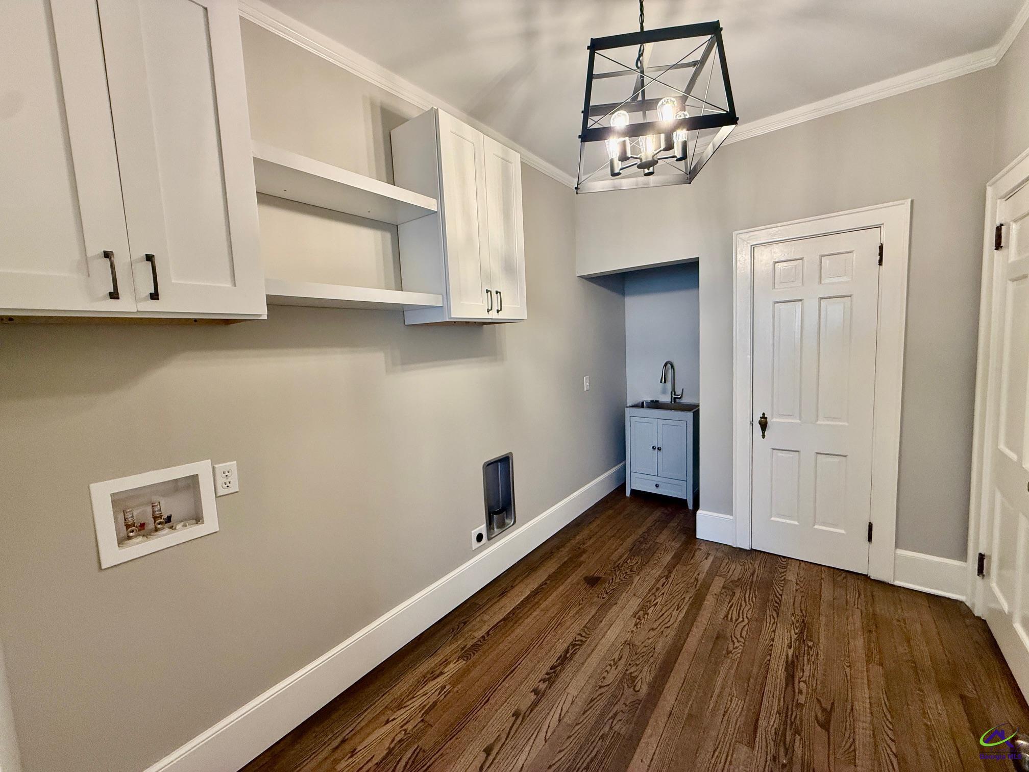 515 Engram Street Montezuma, GA 31063 - Photo 14 of 35 a view of a room with wooden floor and staircase