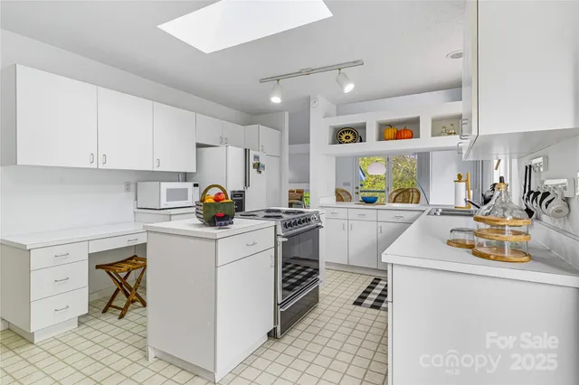 a front view of a house with wooden floor and furniture