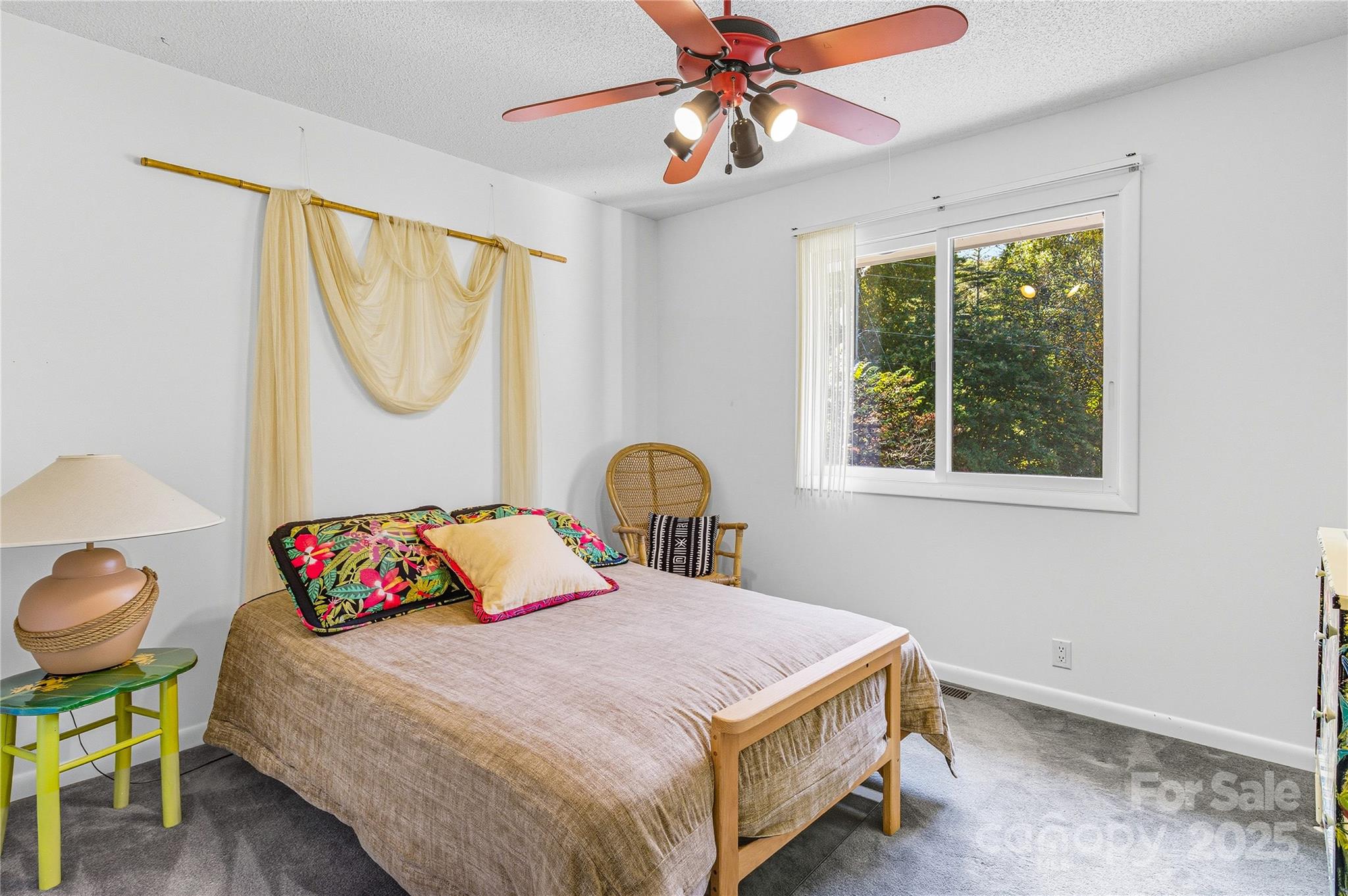 364 South Mills River Road Mills River, NC 28759 - Photo 21 of 47 a bedroom with a bed and a window