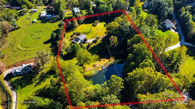 a house with trees in the background