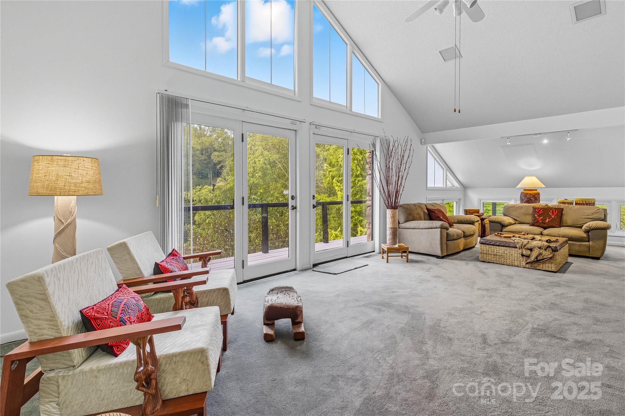 364 South Mills River Road Mills River, NC 28759 - Photo 6 of 47 a living room with furniture and a large window
