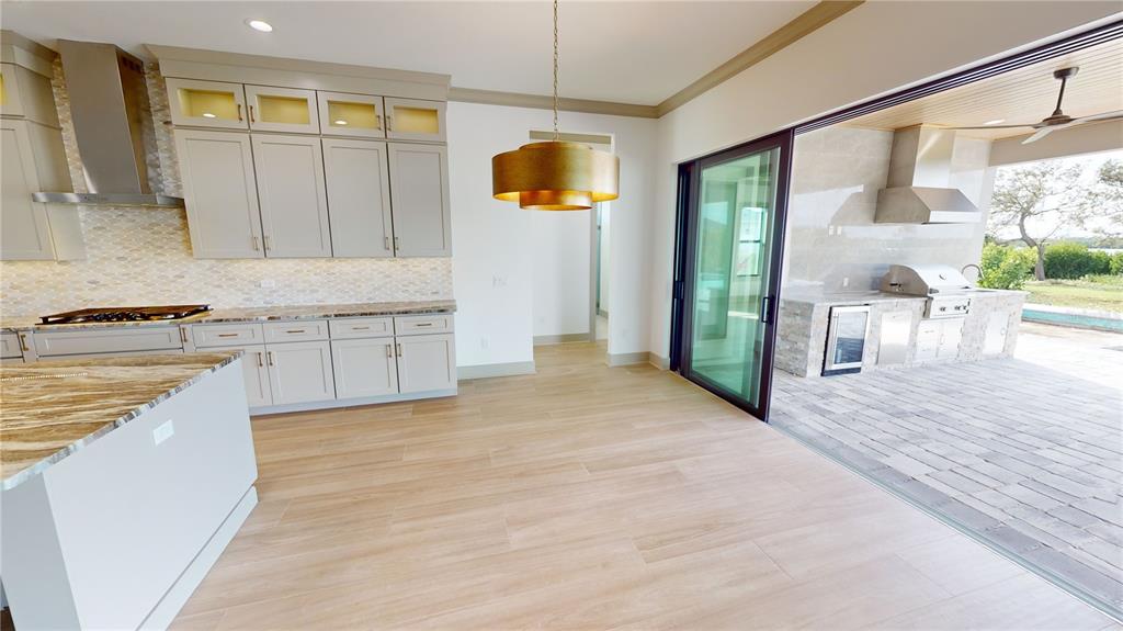 2033 Treasure Lane Punta Gorda, FL 33982 - Photo 17 of 63 a view of a kitchen with a sink and cabinets