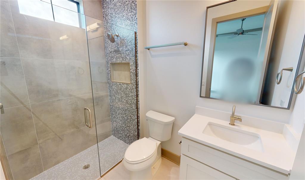 2033 Treasure Lane Punta Gorda, FL 33982 - Photo 33 of 63 a bathroom with a sink toilet and shower