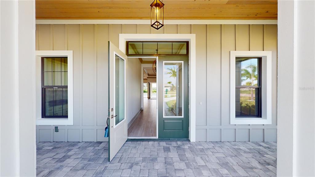 2033 Treasure Lane Punta Gorda, FL 33982 - Photo 5 of 63 a view of a entryway door of the house