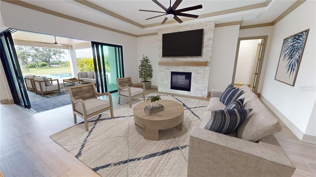 2033 Treasure Lane Punta Gorda, FL 33982 - Photo 10 of 63 a living room with furniture and a fireplace