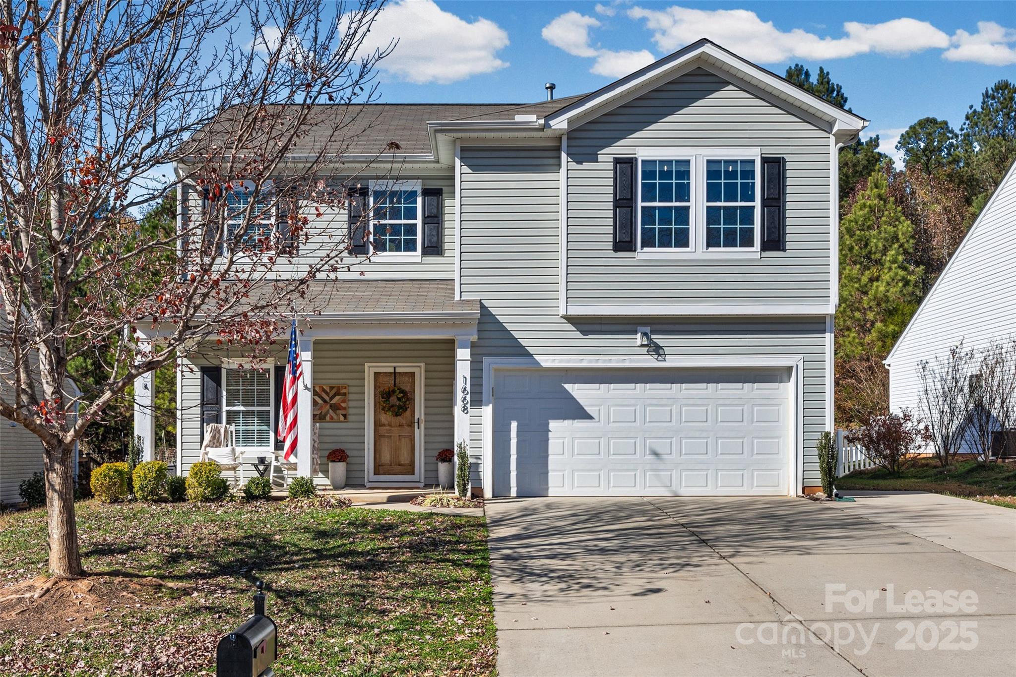 1668 Beleek Ridge Lane Clover, SC 29710 - Photo 1 of 42 a front view of a house with garden